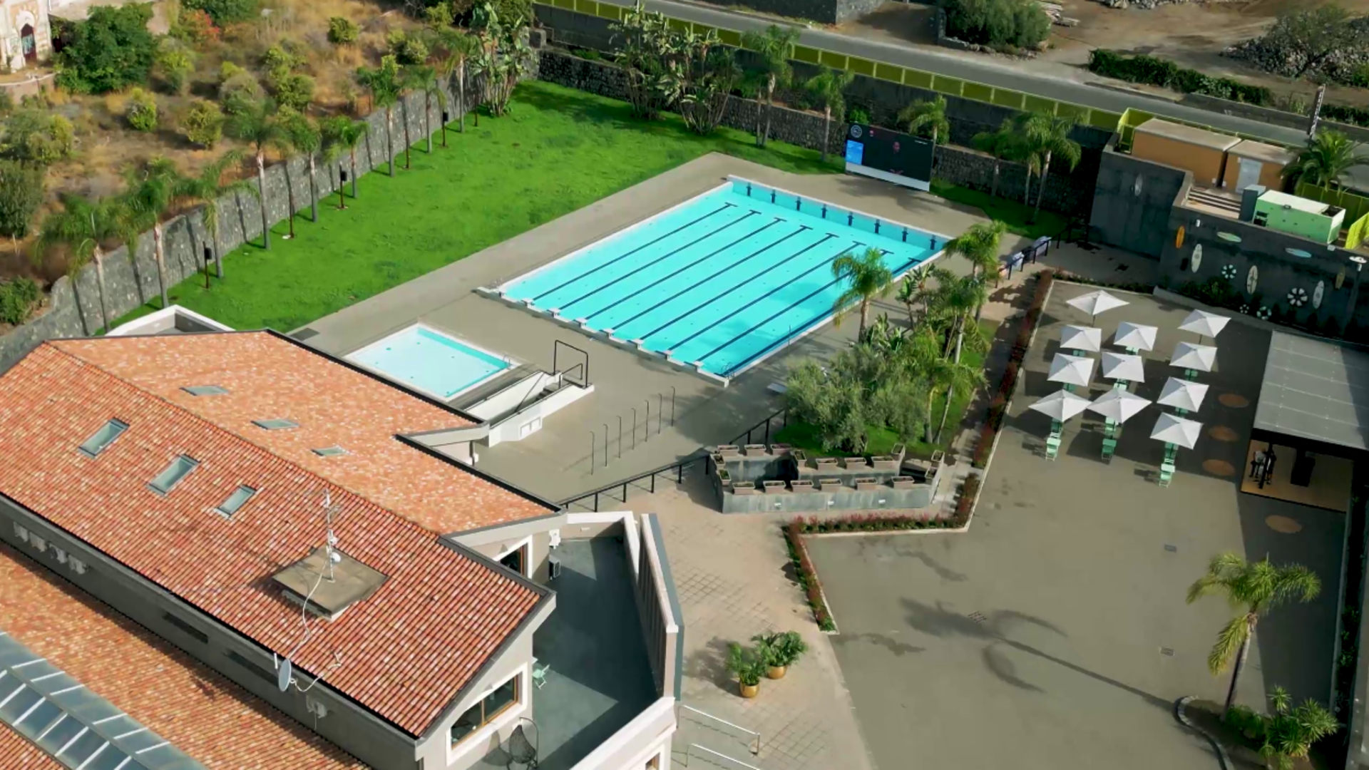 Aerial view of the outdoor pools with the children's pool in the foreground