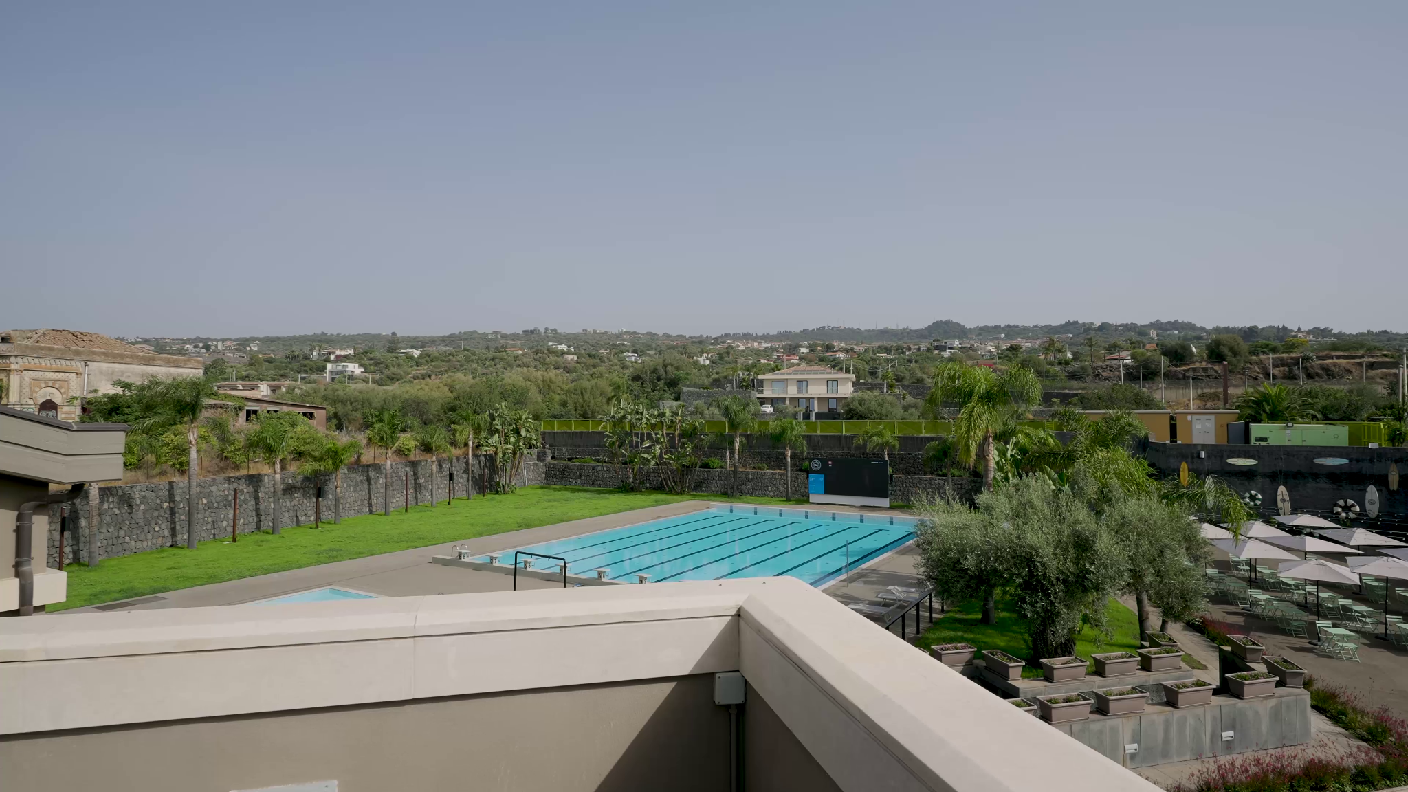 Exterior view of the property and pool